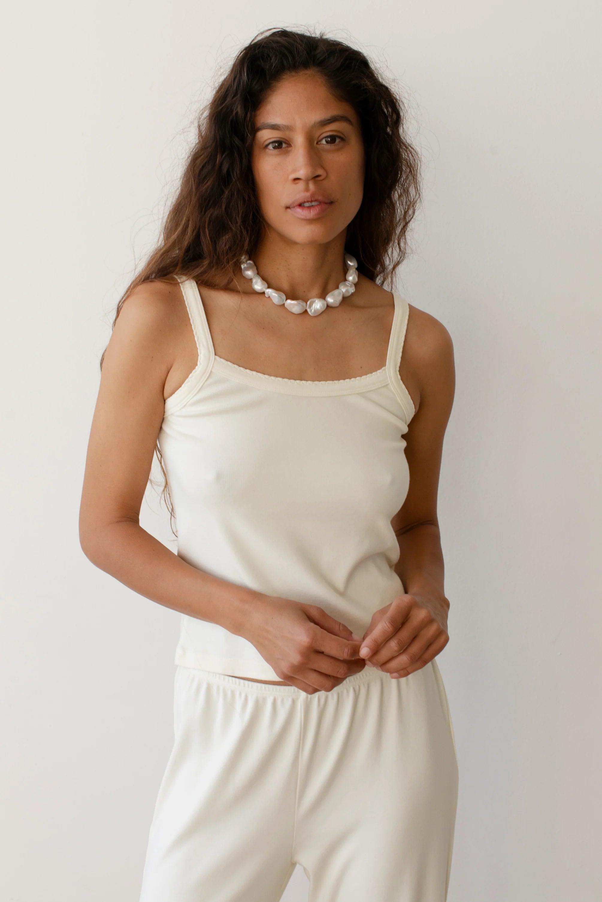cream tank top with scalloped edges