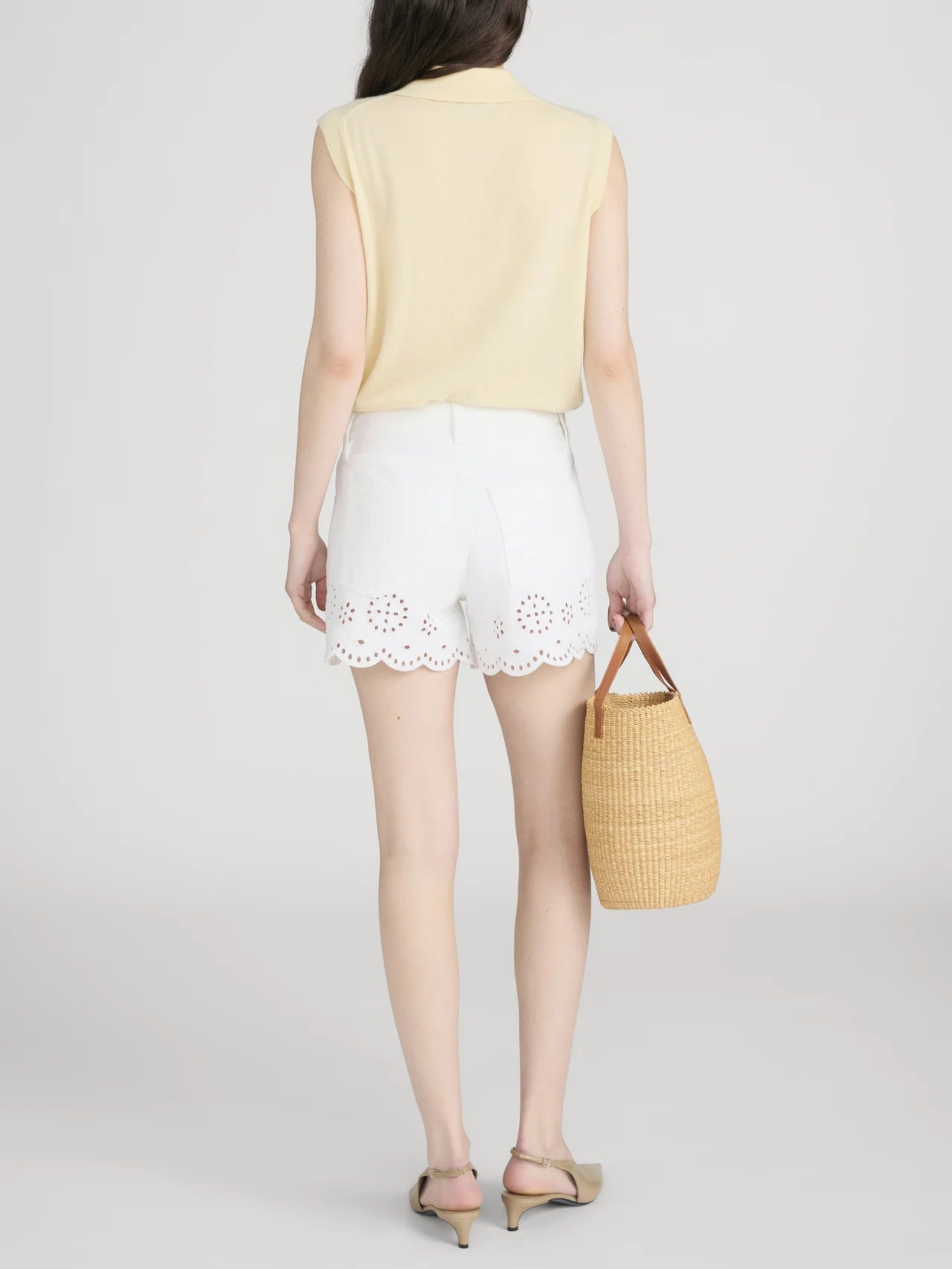 white shorts with eyelet detail on bottom
