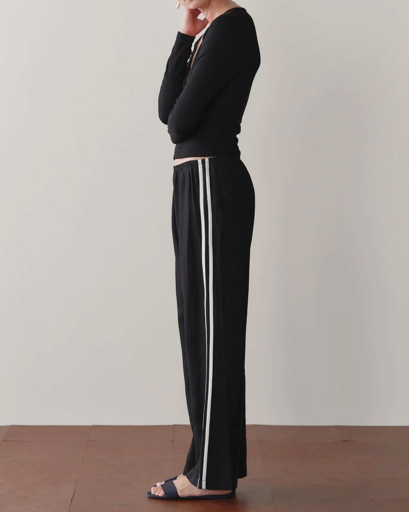 black crop pant with white stripe down the sides