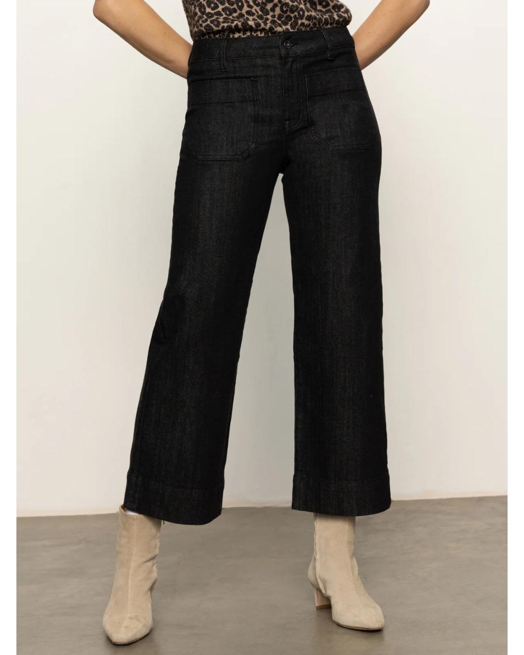 dark wash jeans in a wide leg and cropped