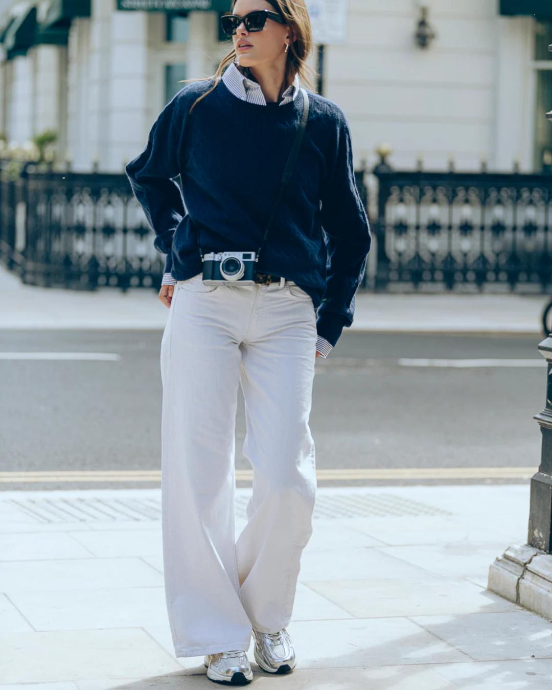 white running shoe with silvers accents