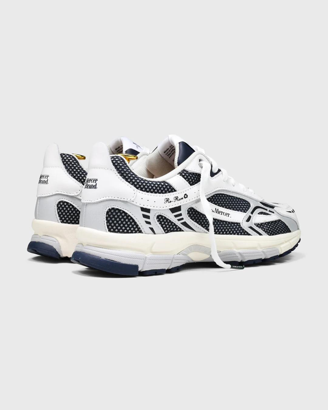 white and navy sneakers