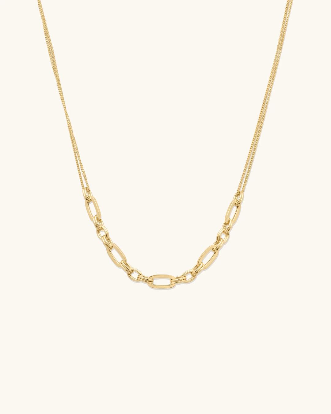 gold necklace with links in the middle