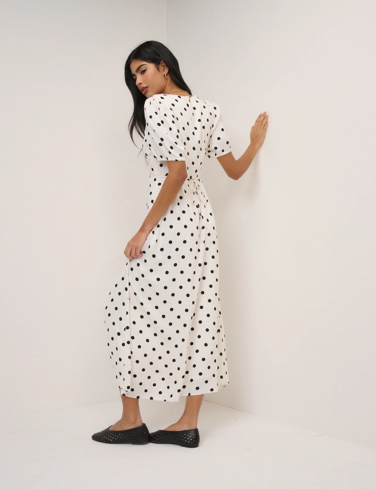 cream dress with polka dots