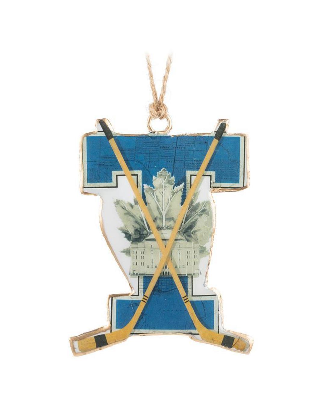 vintage hockey ornament with a blue T and canadian leave
