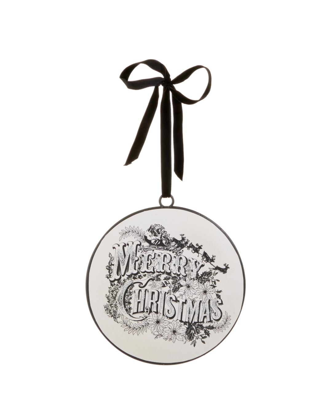 circular disc ornament in black and white that says merry christmas