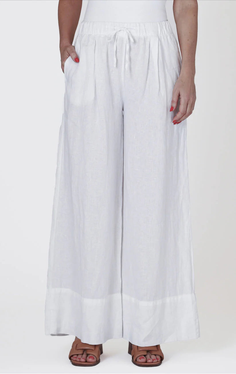a wide leg white linen like pant with a tie waist