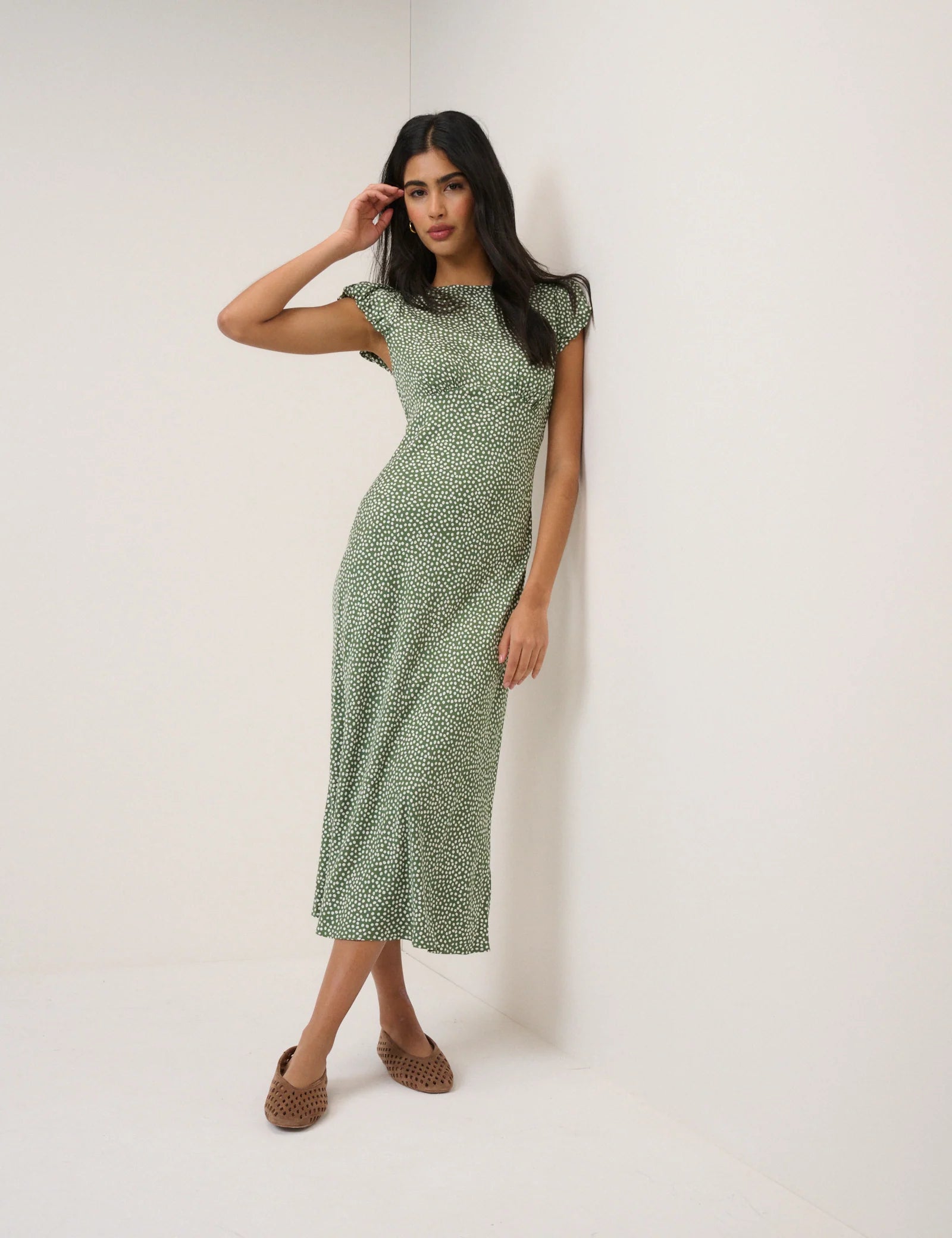 green midi dress with white polka dots