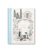 Book titled 'Winter Wishes' with illustrations of people and nature on a white background