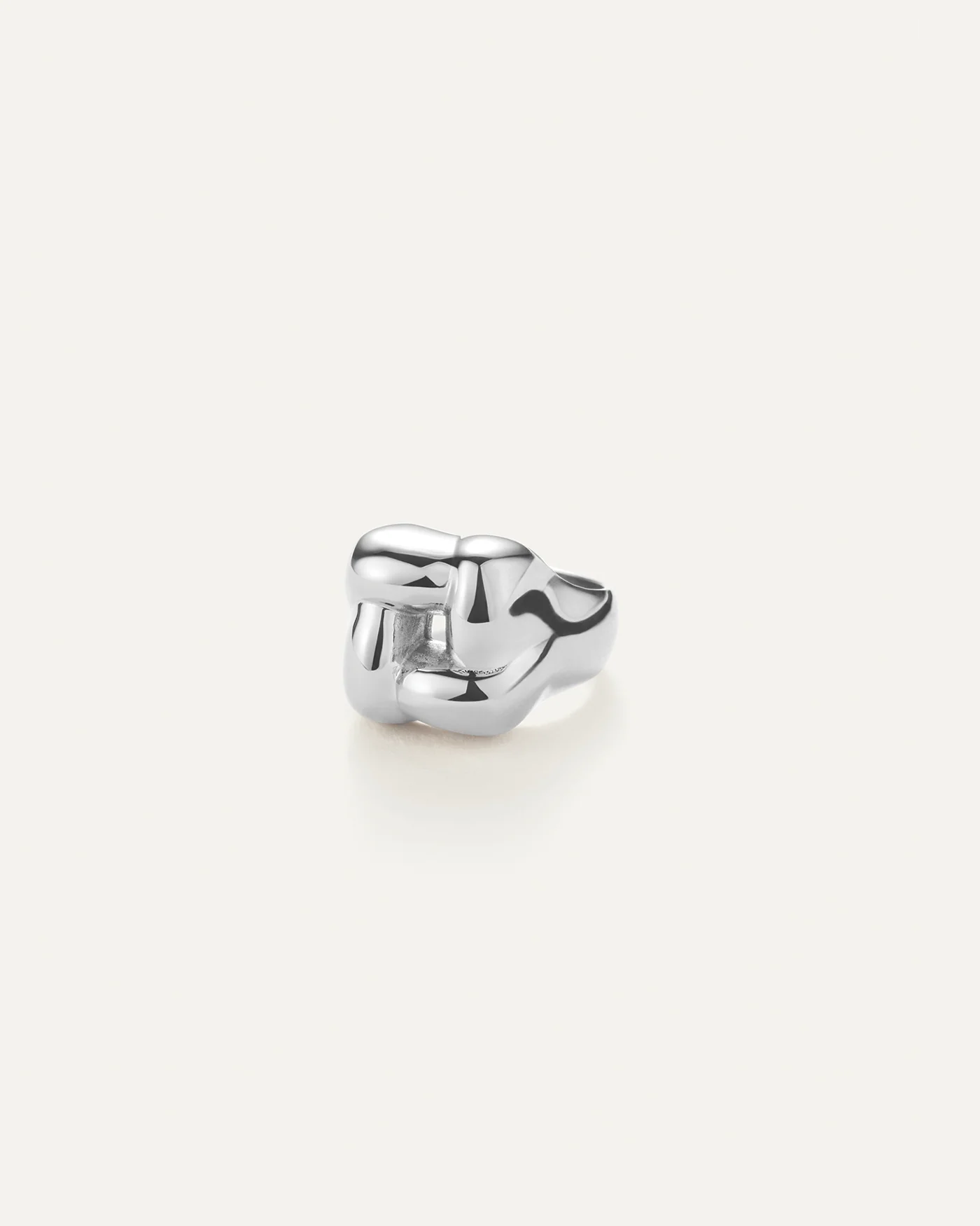 silver statement ring with a woven design on the top