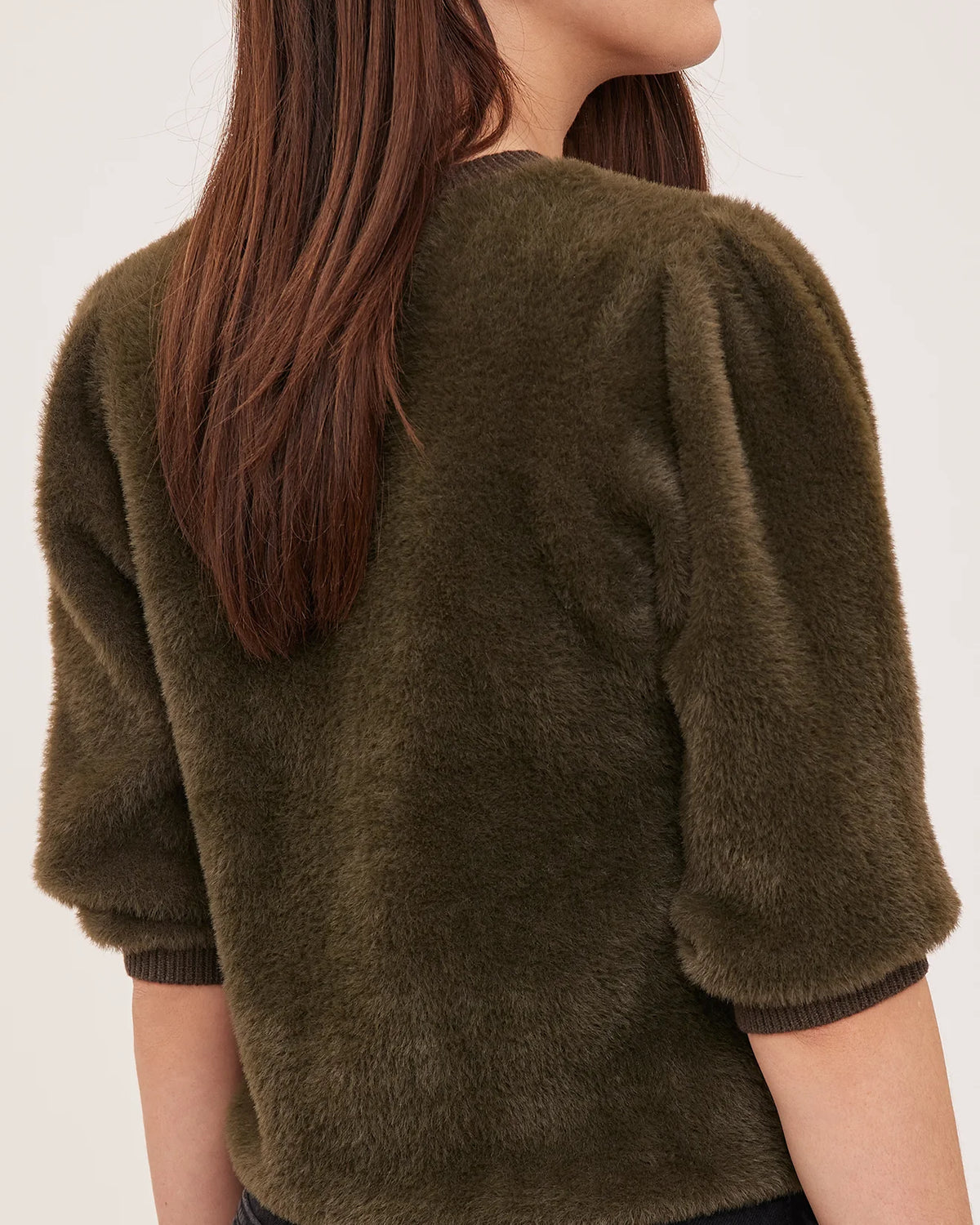 green fuzzy knit sweater