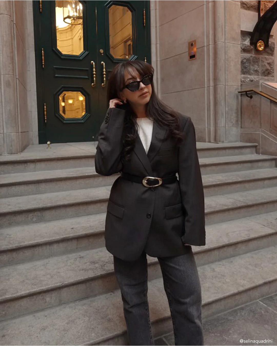 black belt with circle buckle in gold