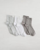 three pack of socks in light grey, white and dark grey