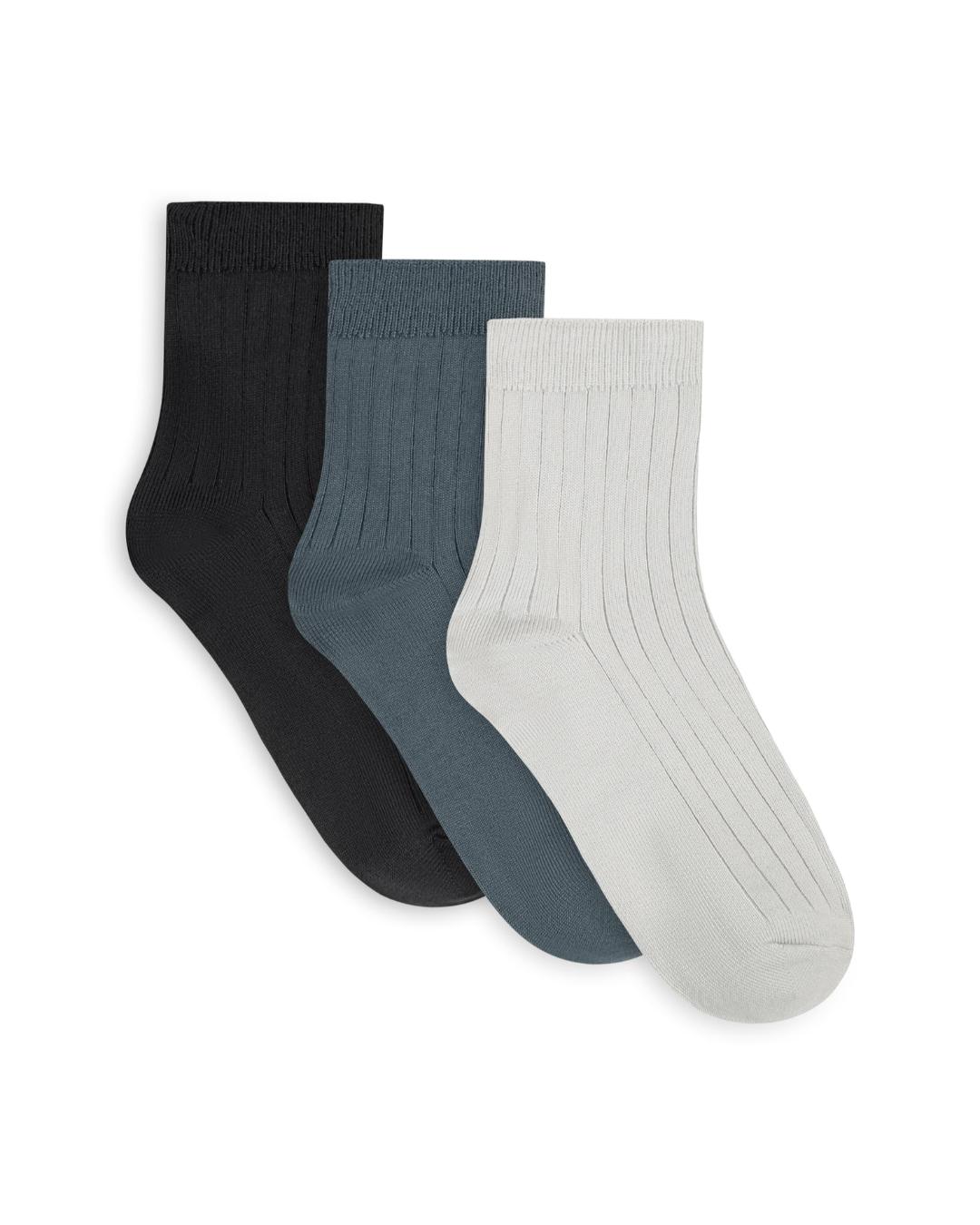 three pack of socks in black, navy and light grey