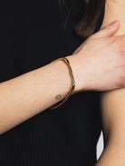 gold statement bangle