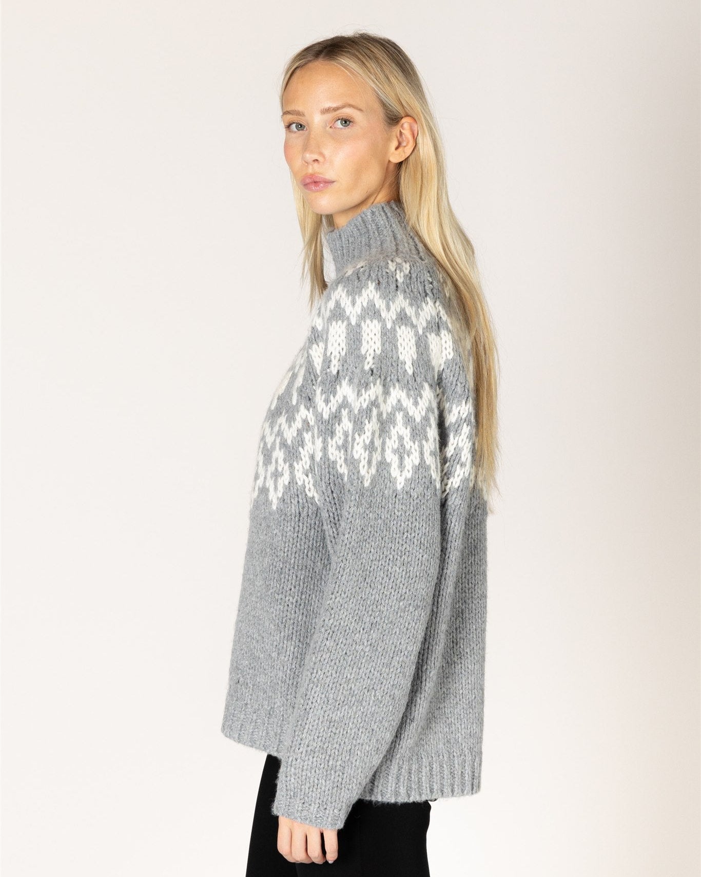 grey mock neck sweater with white fair isle design