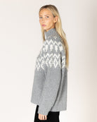 grey mock neck sweater with white fair isle design