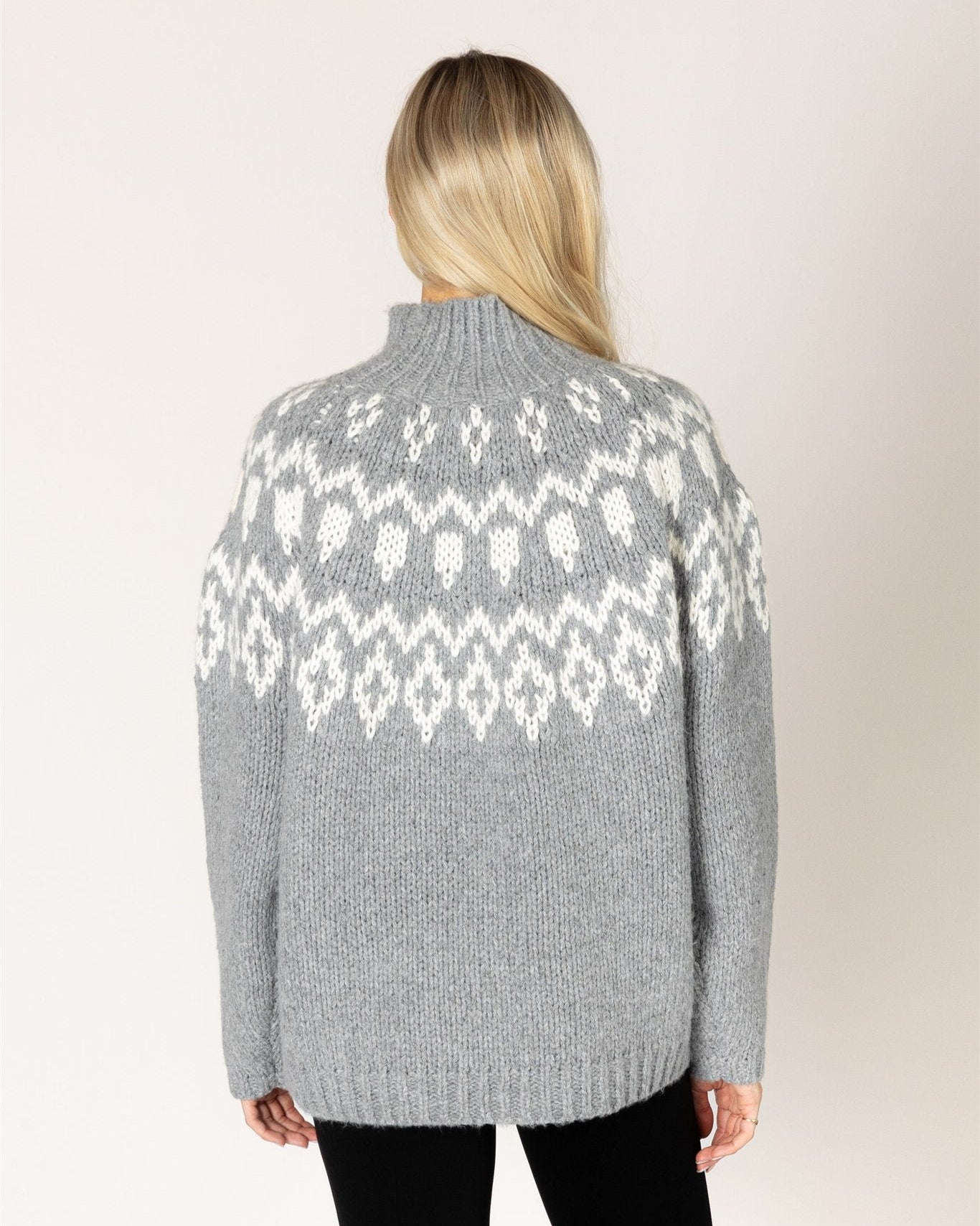 grey mock neck sweater with white fair isle design