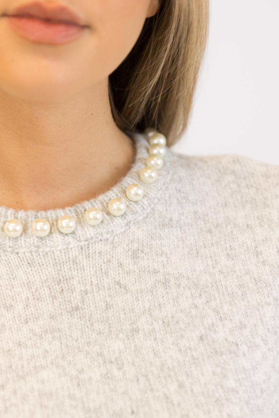 grey knit tee with pearls on the neck line