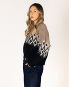 fairisle knit sweater in brown on the top and black on the bottom