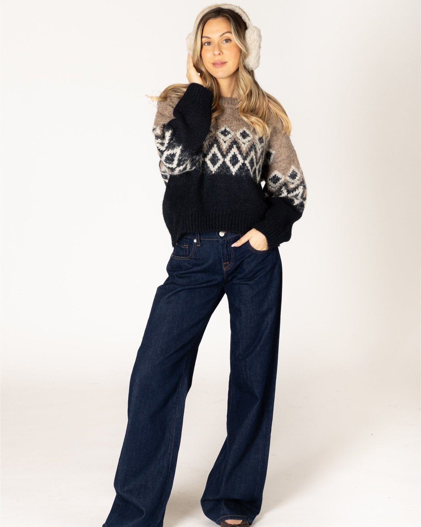 fairisle knit sweater in brown on the top and black on the bottom