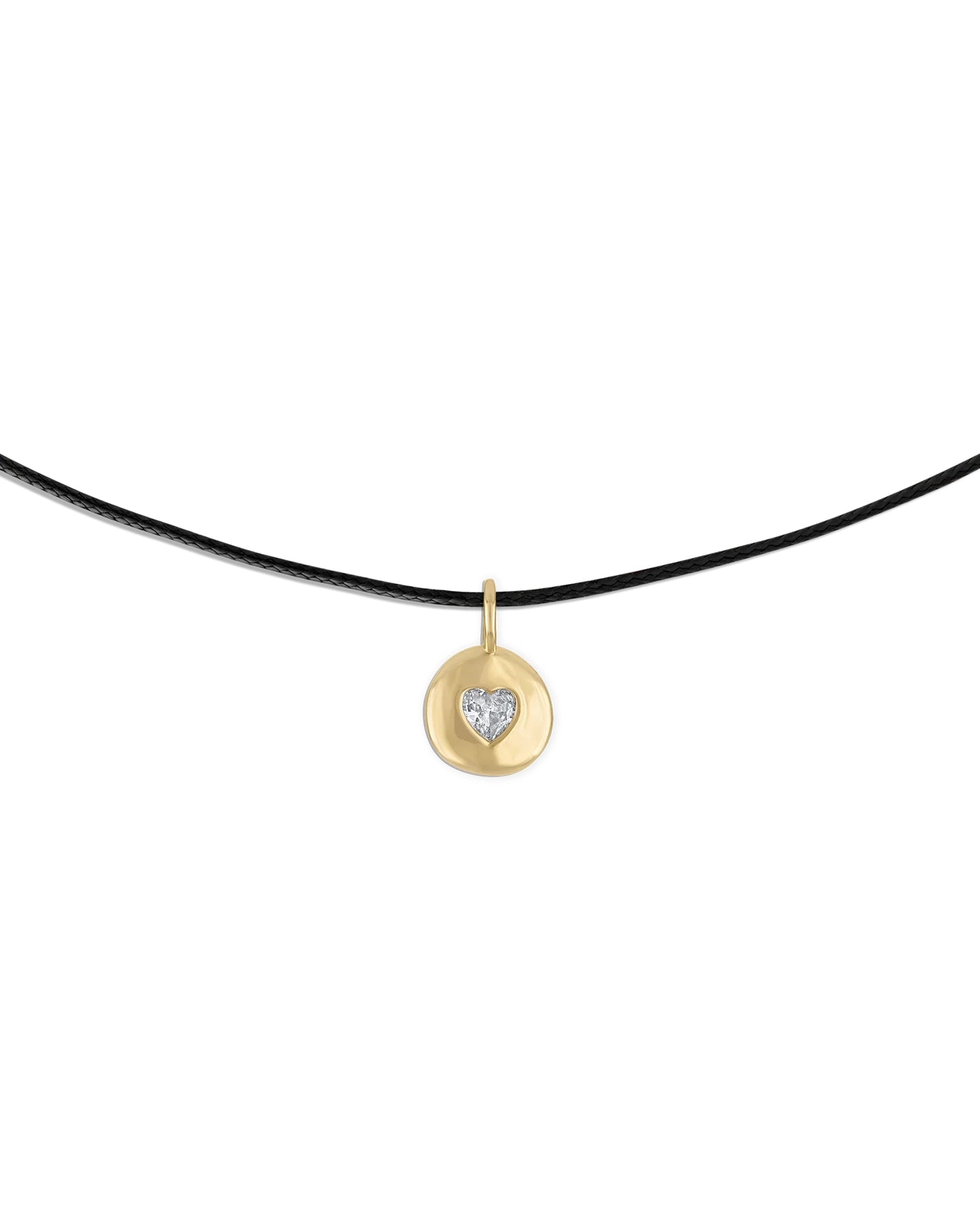 a leather necklace with round gold heart pendant 