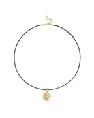 a leather necklace with round gold heart pendant 