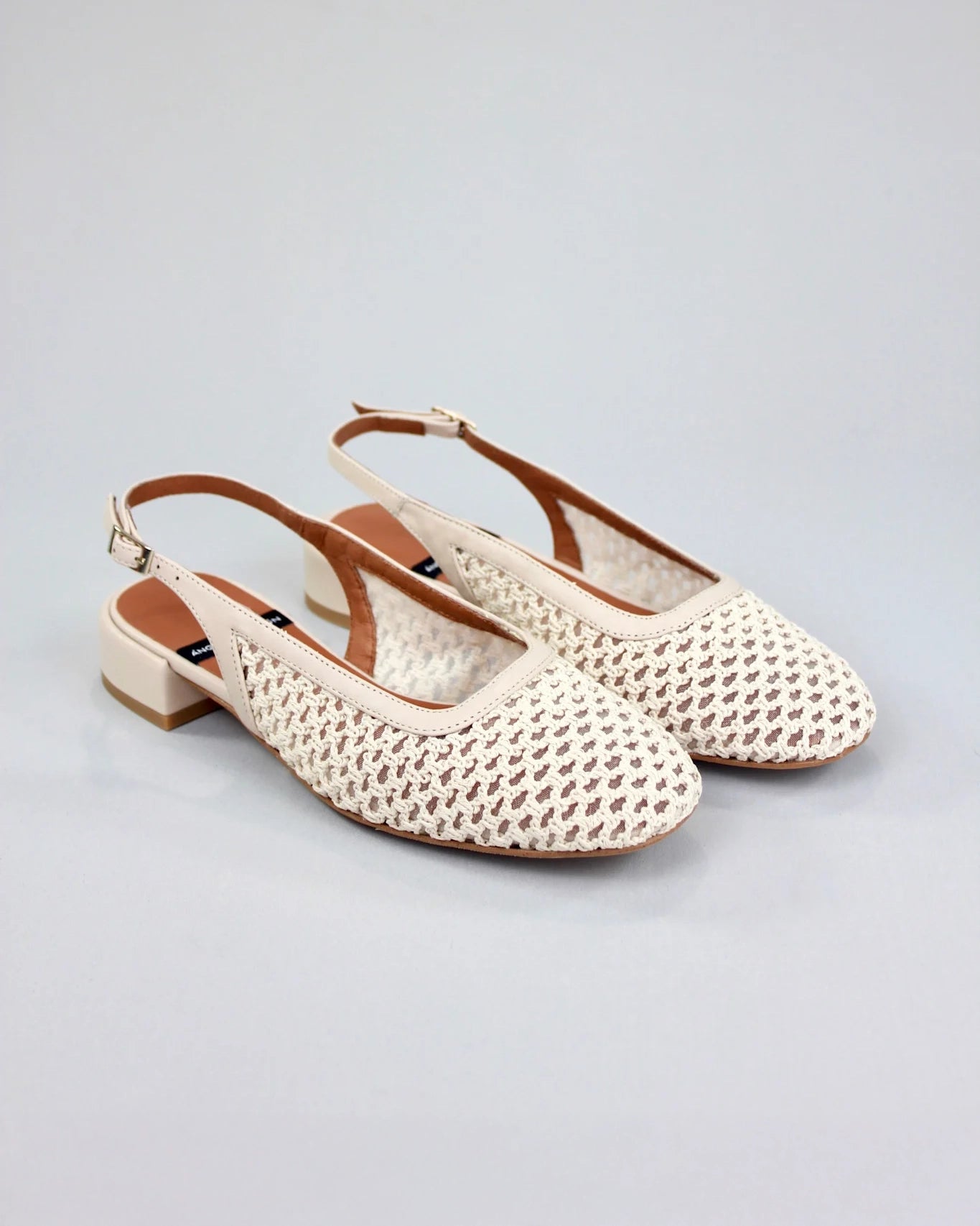 The Angel Alarcon Caroline sling back mesh ivory shoe with a little heel and round toe 