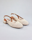 The Angel Alarcon Caroline sling back mesh ivory shoe with a little heel and round toe 