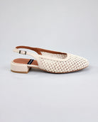 The Angel Alarcon Caroline sling back mesh ivory shoe with a little heel and round toe 