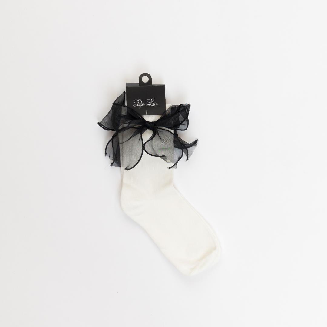 white sock with black satin bow on the side