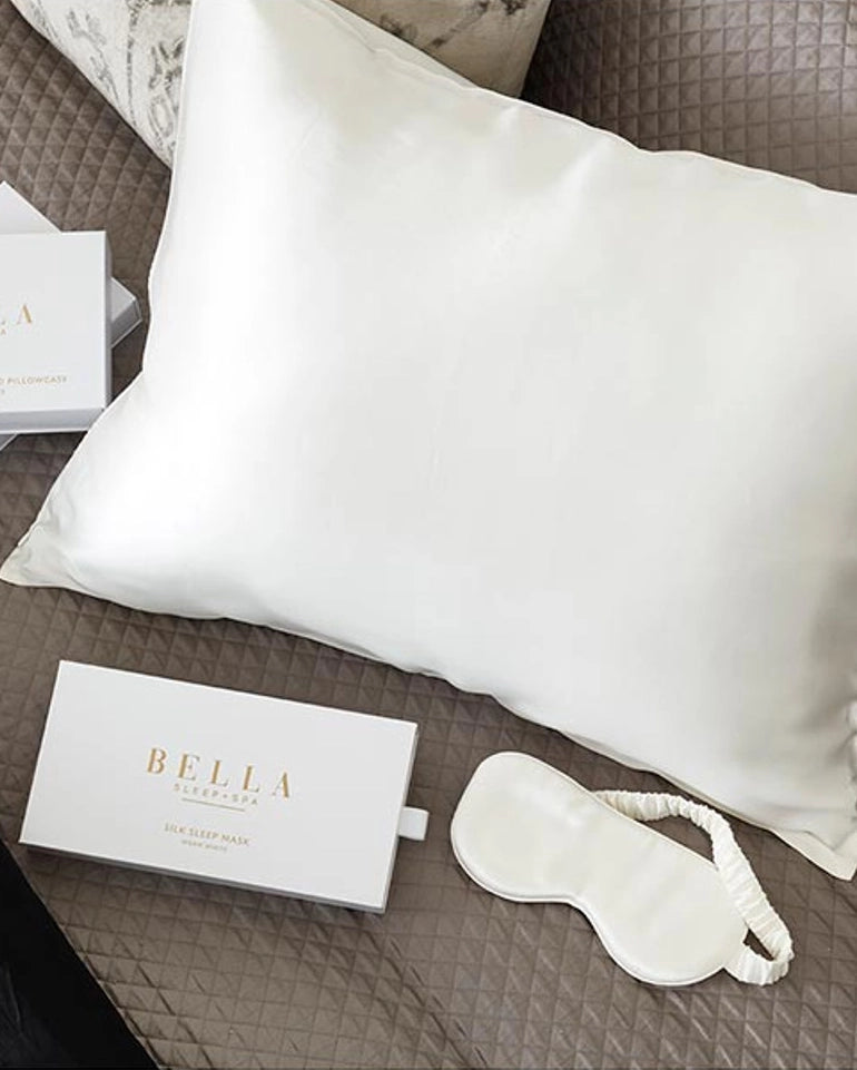 a picture of a white silk sleep mask