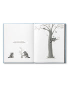 Page of Children's Book called 'Chasing Dreams: how to add more daring to your doing' by Kobi Yamada with a racoon planting trees and watching it grow