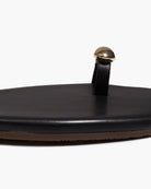 black sandal with gold toe piece 