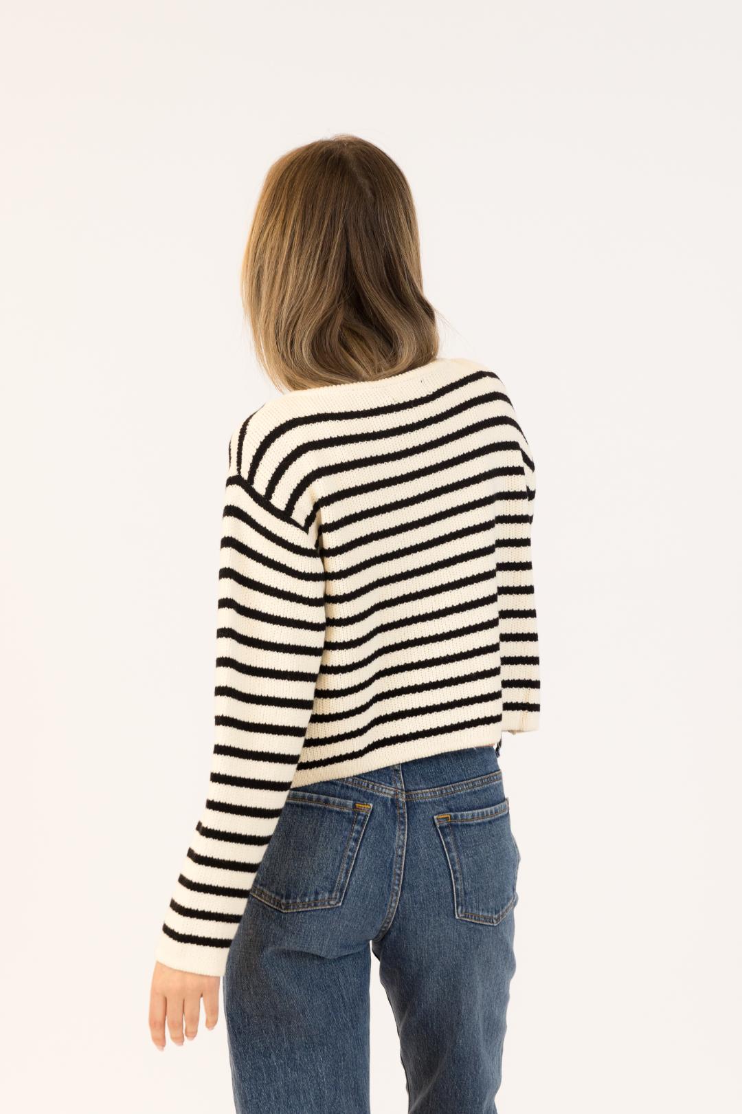 back view of a black and white striped cardigan