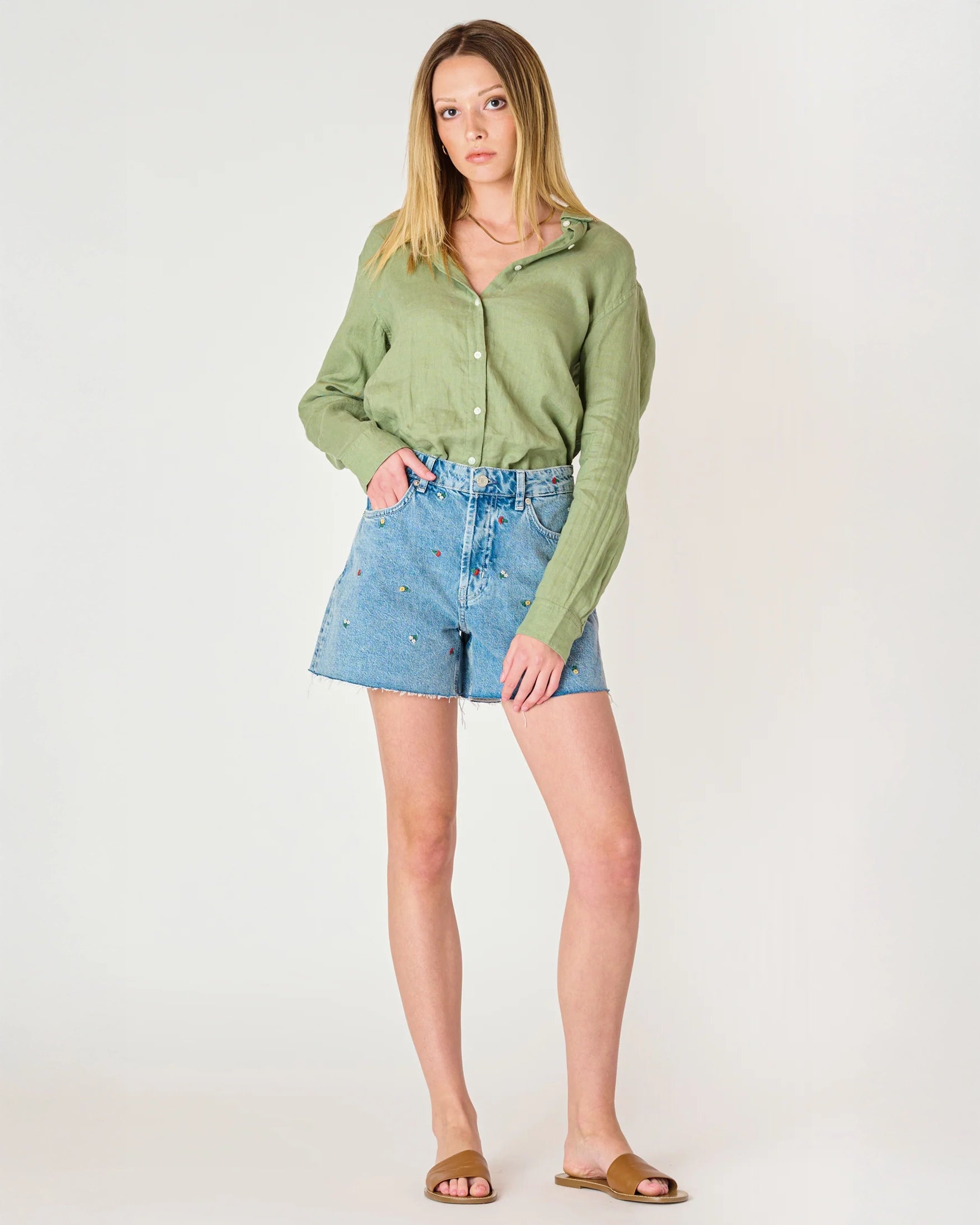 denim jean shorts with a floral embroidered pattern