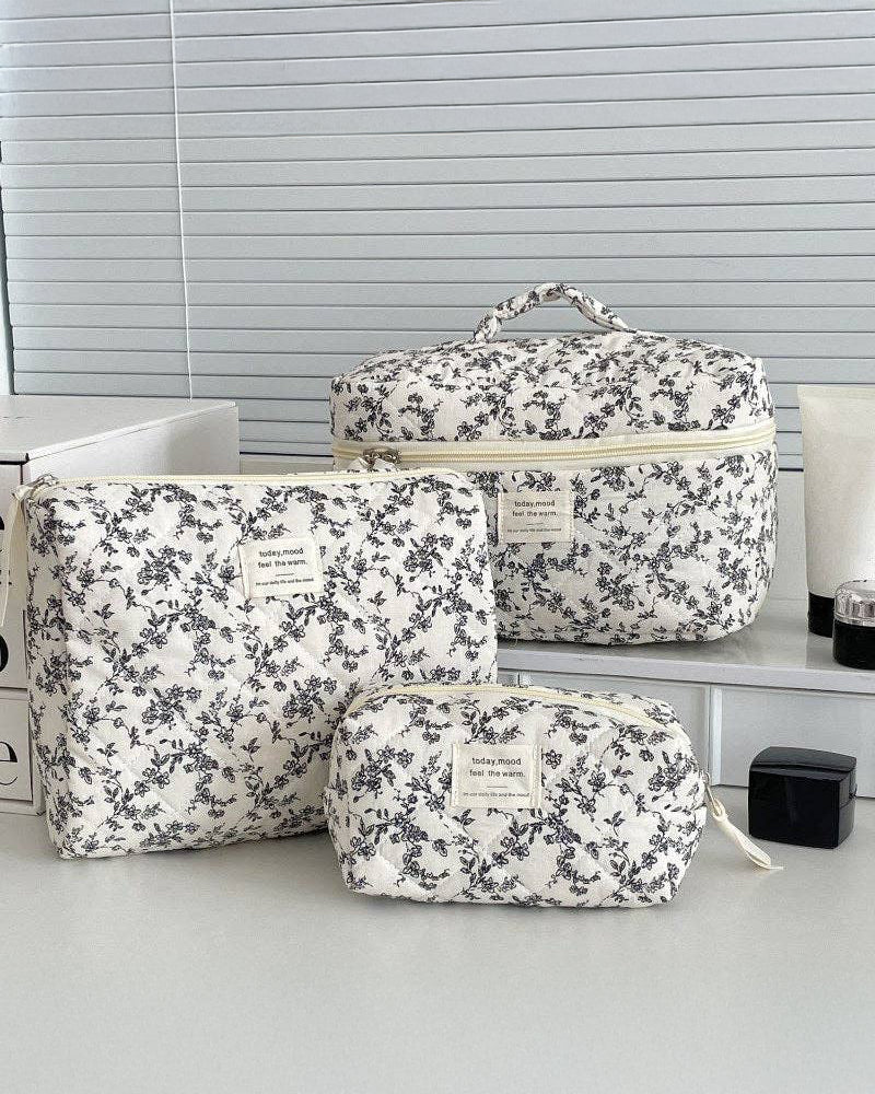 Set of floral-patterned makeup travel bags