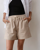 Woman wearing chino drawstring shorts