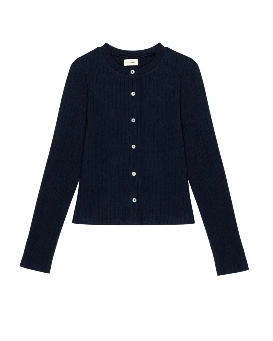 a woman wearing a dark navy blue ribbed button down cardigan 