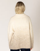 short coat in brown and white houndstooth design