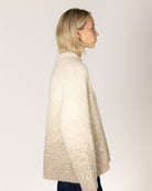 short coat in brown and white houndstooth design