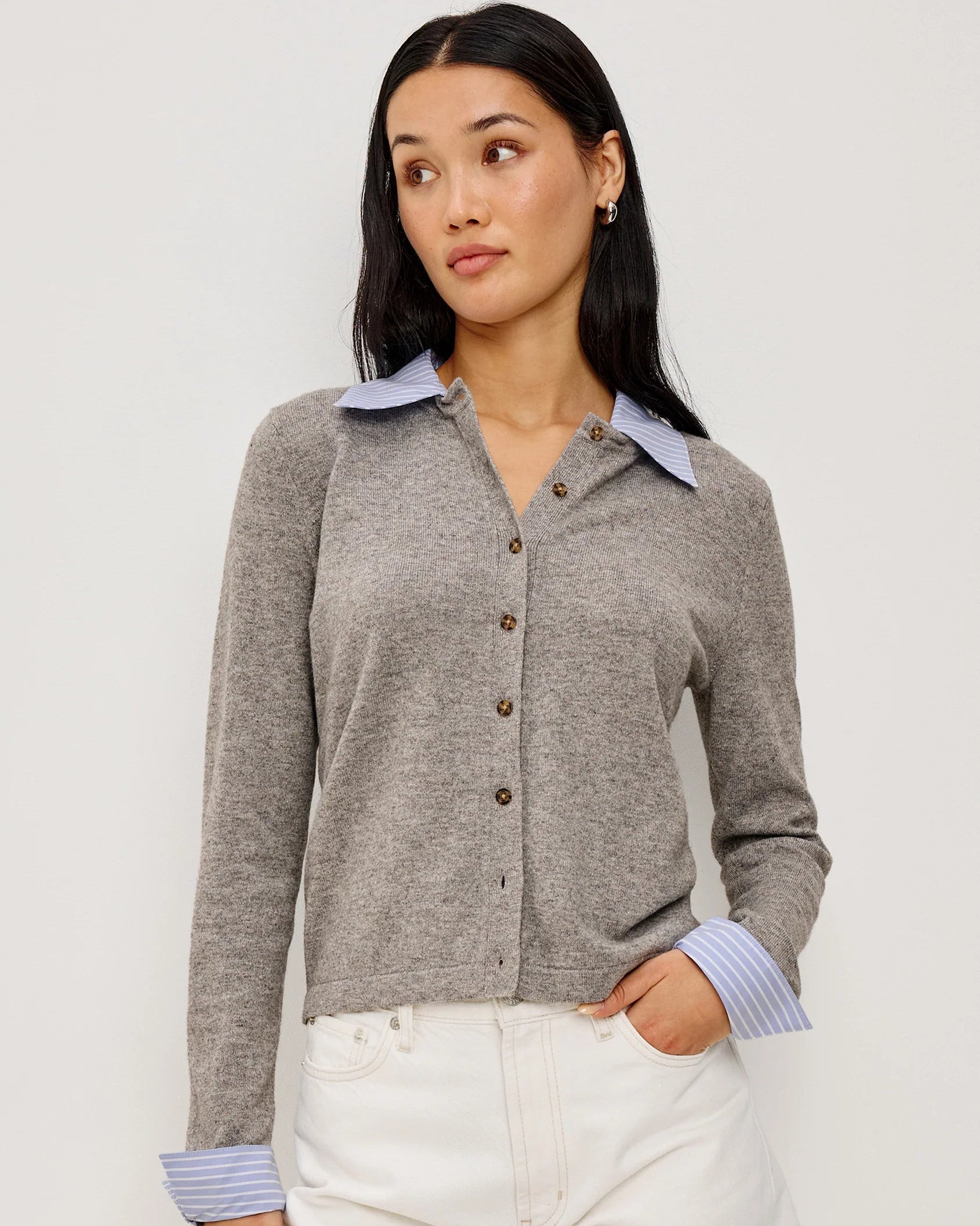 grey cardigan with blue and white stripe blouse collar and cuff