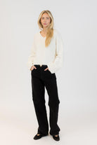 v-neck white sweater