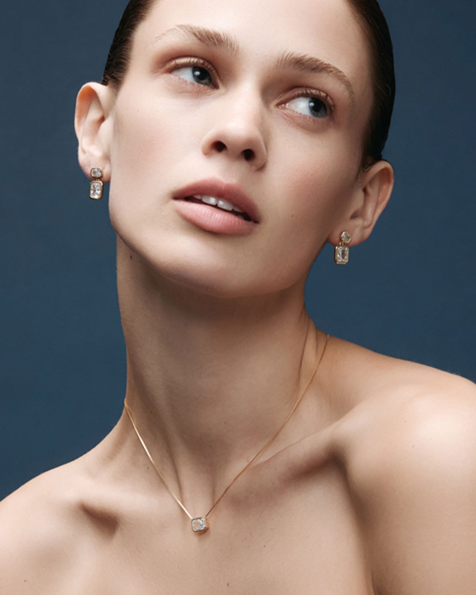 gold necklace with diamond square pendant