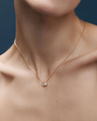 gold necklace with diamond square pendant
