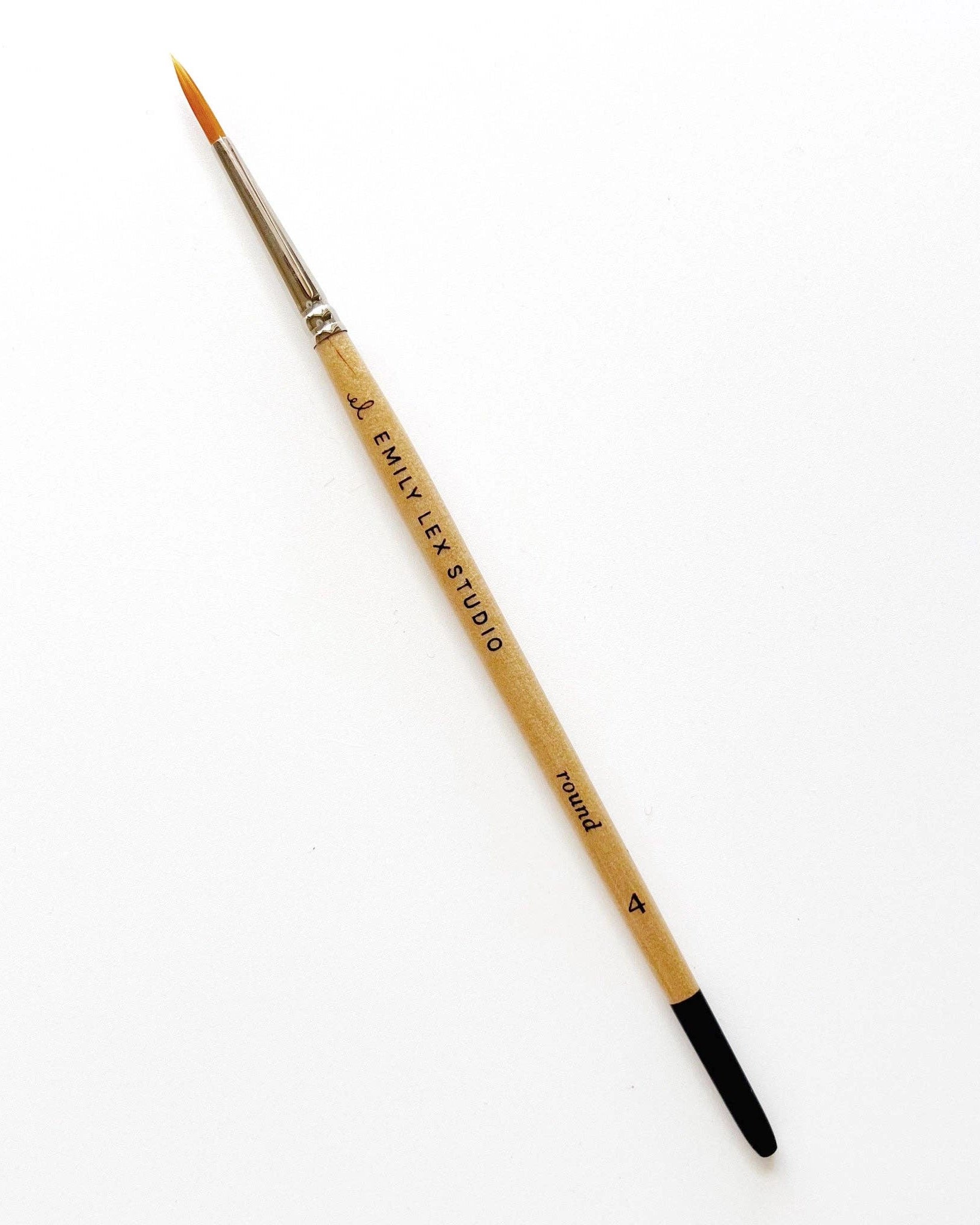 Watercolour paintbrush with wooden handle with 'Emily Lex Studio' on it