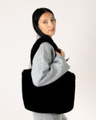 large black faux fur tote bag