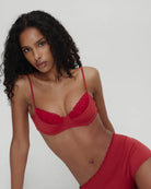 woman wearing frankies bikini austin bikini top in valentine red from the bella hadid collaboration