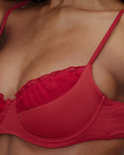 woman wearing frankies bikini austin bikini top in valentine red from the bella hadid collaboration