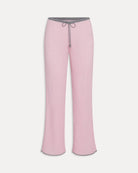 A pair of pink ribbed lounge pants with grey drawstring and trim
